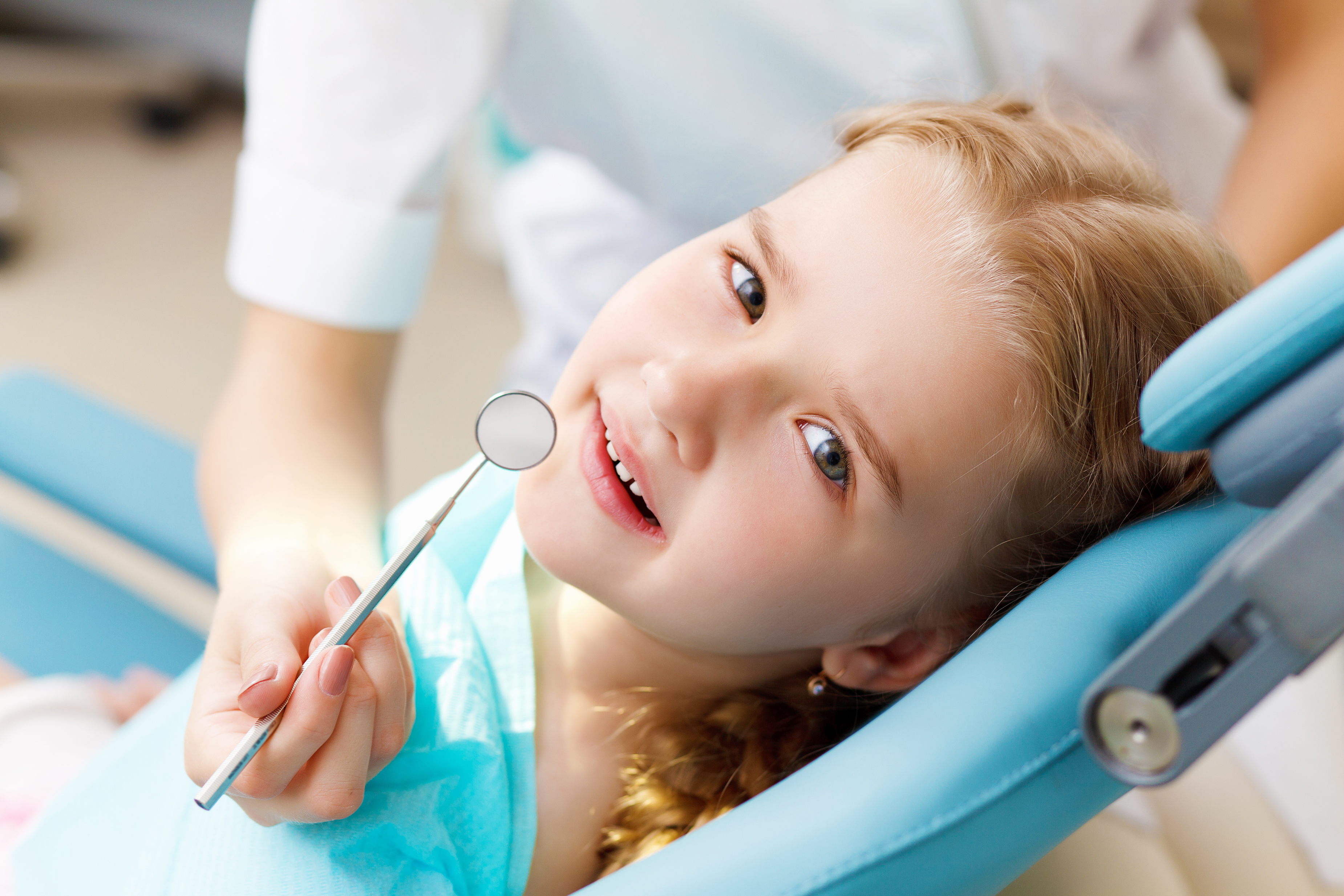 bigstock-little-girl-visiting-dentist-35934937